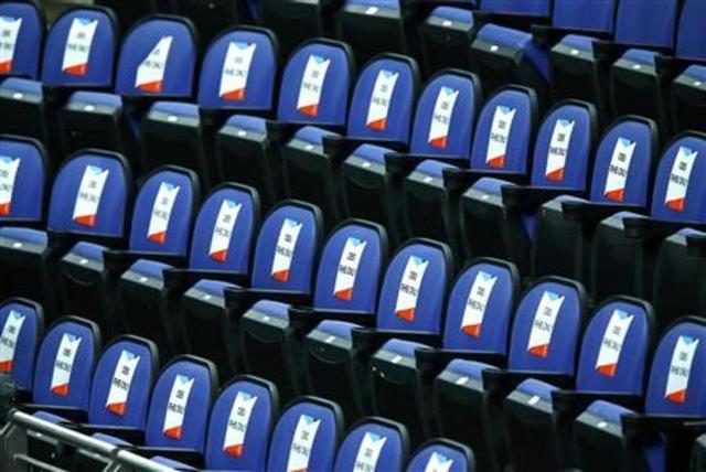 Empty seats are seen during the women's gymnastics qualification in the North Greenwich Arena during the London 2012 Olympic Games